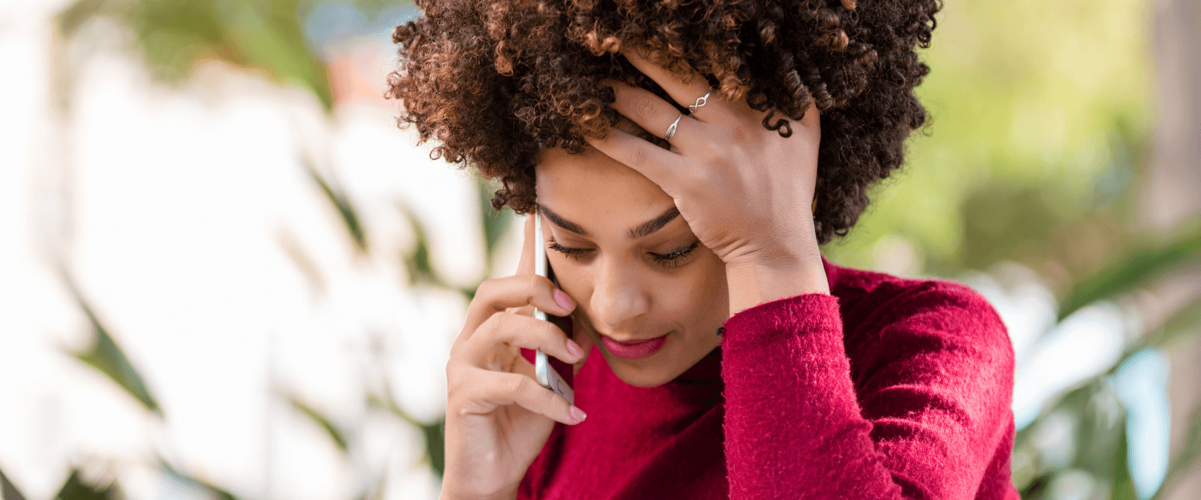 A woman researching what it means it have a credit score under 500 and how to improve it.