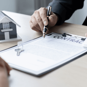 signing a contract to buy a new home
